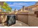 Cozy outdoor patio with a wall and an AC unit at 609 E Mesquite Cir # D132, Tempe, AZ 85288
