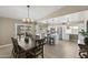 Bright dining area adjacent to the kitchen with outdoor access at 6605 W Altadena Ave, Glendale, AZ 85304