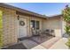 Inviting front porch with brick flooring and comfortable seating area at 6605 W Altadena Ave, Glendale, AZ 85304