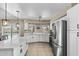 Beautifully designed kitchen with modern finishes and an island at 6605 W Altadena Ave, Glendale, AZ 85304