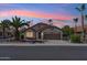 Charming single-story home with desert landscaping and an attached two car garage at 6719 W Sack Dr, Glendale, AZ 85308