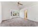 Spacious main bedroom with a bay window and a ceiling fan at 6719 W Sack Dr, Glendale, AZ 85308