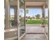 Backyard view from the home's interior, showcasing the outdoor space and landscaping at 6861 W Calle Lejos --, Peoria, AZ 85383
