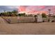 Fenced equestrian arena, with jumps set up, suitable for training and events at 6861 W Calle Lejos --, Peoria, AZ 85383