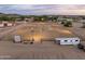 Illuminated equestrian area at dusk, fenced for training and events at 6861 W Calle Lejos --, Peoria, AZ 85383