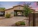 A spacious horse property with a covered area and ample parking, set against a beautiful twilight sky at 6861 W Calle Lejos --, Peoria, AZ 85383