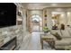 Elegant foyer with beautiful floors, fireplace, and views to the formal dining area at 6861 W Calle Lejos --, Peoria, AZ 85383
