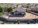 Aerial view of a large backyard with potential for customization, including a pool and covered patio area at 7102 W Pueblo Ave, Phoenix, AZ 85043
