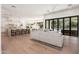 Open-concept living space connecting the kitchen, dining, and living areas with natural light at 7710 E Tardes Dr, Scottsdale, AZ 85255