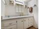 Bathroom with vanity and cabinets, large countertop and medicine cabinet at 7807 E Main St # E2, Mesa, AZ 85207