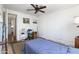 Bedroom with fan, closet, and adjacent room at 7807 E Main St # E2, Mesa, AZ 85207