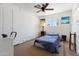 Bedroom with window, fan and closet for ample storage at 7807 E Main St # E2, Mesa, AZ 85207