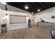 Spacious common area with a refreshment station, featuring coffee and popcorn, with durable vinyl flooring at 7807 E Main St # E2, Mesa, AZ 85207