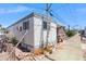 This property offers an air conditioning unit and is on a lot that features rocks and sparse vegetation at 7807 E Main St # E2, Mesa, AZ 85207