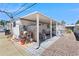 This property features a covered patio with gravel and cement tile and a storage area at 7807 E Main St # E2, Mesa, AZ 85207