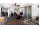 Spacious living room featuring a comfortable seating area and ceiling fan at 7807 E Main St # E2, Mesa, AZ 85207