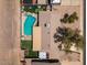 Birds eye view of the backyard oasis with a pool, putting green, and desert landscaping at 818 N Terrace St, Mesa, AZ 85203