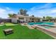 Spacious backyard with a pool, patio, and well-maintained landscaping at 818 N Terrace St, Mesa, AZ 85203