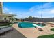 Gorgeous backyard with a sparkling pool, hot tub, and outdoor seating area at 818 N Terrace St, Mesa, AZ 85203
