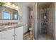 Bathroom featuring modern fixtures, a walk-in shower, and stylish vanity at 818 N Terrace St, Mesa, AZ 85203