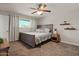 Comfortable bedroom with natural light, ceiling fan, and stylish decor at 818 N Terrace St, Mesa, AZ 85203