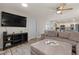 Open living room with a view to the kitchen, comfortable seating, and modern decor at 818 N Terrace St, Mesa, AZ 85203