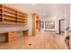 The basement area includes a built-in bookcase and desk, as well as a tiled floor at 8606 S Dorsey Ln, Tempe, AZ 85284