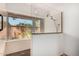 Contemporary shower stall with clear glass partition, and view of outside foliage at 8606 S Dorsey Ln, Tempe, AZ 85284
