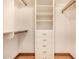 Walk-in closet with shelving and drawers for optimal storage at 8606 S Dorsey Ln, Tempe, AZ 85284