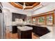 Bright kitchen with light counters, dark wood cabinets, and a view to the backyard at 8606 S Dorsey Ln, Tempe, AZ 85284
