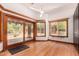 Cozy living room with a glass sliding door, big window, and lots of natural light at 8606 S Dorsey Ln, Tempe, AZ 85284