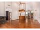 Spacious living room featuring a fireplace, high ceilings, hardwood floors, and an open layout at 8606 S Dorsey Ln, Tempe, AZ 85284