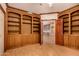 Office featuring custom built-in cabinetry with wood trim and neutral walls at 8606 S Dorsey Ln, Tempe, AZ 85284