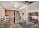 Modern kitchen featuring stainless steel appliances, a breakfast bar, and ample counter space perfect for cooking and entertaining at 8803 N 105Th Dr, Peoria, AZ 85345
