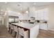 Well-equipped kitchen featuring stainless steel appliances and a large island at 9112 E Palm Tree Dr, Scottsdale, AZ 85255