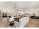Spacious living room featuring an open floor plan and seamlessly integrates the kitchen and dining areas at 9112 E Palm Tree Dr, Scottsdale, AZ 85255