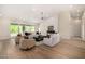 Bright living room featuring a fireplace, lots of natural light, and neutral décor at 9112 E Palm Tree Dr, Scottsdale, AZ 85255