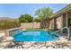 A private backyard pool oasis with mountain views and a meticulously landscaped yard at 9112 E Palm Tree Dr, Scottsdale, AZ 85255