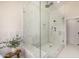 Stylish bathroom with a glass enclosed shower featuring modern fixtures and a built-in bench at 9112 E Palm Tree Dr, Scottsdale, AZ 85255