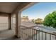 Balcony overlooking neighborhood homes and tree-lined street at 9350 W Williams St, Tolleson, AZ 85353