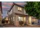 Charming two-story home featuring a covered porch and well-kept landscaping at 9350 W Williams St, Tolleson, AZ 85353
