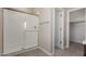 Bathroom with a glass enclosed shower and walk-in closet at 9412 E Sequence Ave, Mesa, AZ 85212