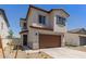 Charming two-story home with a two-car garage and desert landscaping at 9412 E Sequence Ave, Mesa, AZ 85212