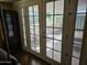 The living room offers easy access to the backyard through elegant glass doors at 10307 W Oakmont Dr, Sun City, AZ 85351