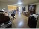 Open concept living area with furniture, creating a warm and inviting space with natural light at 10307 W Oakmont Dr, Sun City, AZ 85351