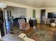 Spacious living room featuring a comfortable seating area and open access to other rooms at 10307 W Oakmont Dr, Sun City, AZ 85351