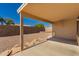 Covered patio overlooking the backyard with a gravel landscape at 10956 E Delta Ave, Mesa, AZ 85208