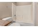 Clean bathroom with a white shower-tub combo at 10956 E Delta Ave, Mesa, AZ 85208