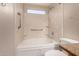 Bathroom featuring a tiled shower, soaking tub, and grab bar at 10956 E Delta Ave, Mesa, AZ 85208