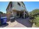 Spacious backyard featuring a covered patio and desert landscaping at 1350 S Greenfield Rd # 1130, Mesa, AZ 85206
